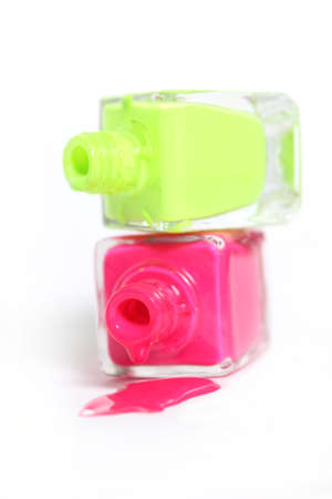 Pink and Yellow Neon Nail Polish on Whiteの写真素材