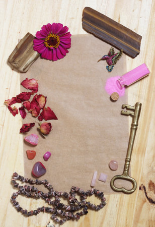Pink Flower With Pink Stones and Brass Key on old Paper Pink Theme Backgroundの写真素材