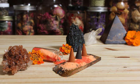 Aragonite Crystal With Incense and Stone Pyramid on Meditation Tableの写真素材