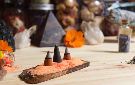 Rock Crystal With Incense and Stone Pyramid on Meditation Tableの写真素材