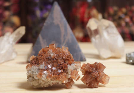 Aragonite Carbonate Crystals With Pyramid in Background Shallow DOF
