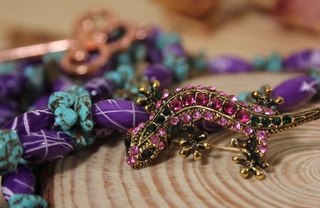 Southwestern Style Jewelry on Wooden Table With Rustic Decorations
