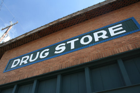 Vintage Sign on Outside of Historic Downtown Building in Rural East Texasの写真素材