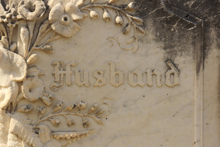 Close up of Historic Gravestone With Word Husband Rural East TXの写真素材