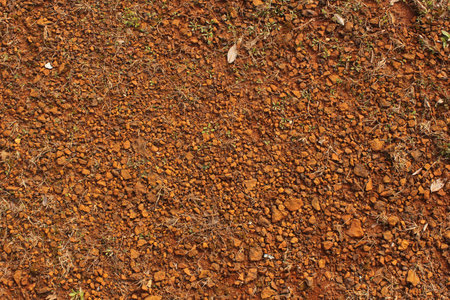 Red Dirt With Rocks and Gravel Background West Texas Dirt