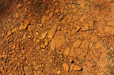 Red Dirt With Rocks and Gravel Background West Texas Dirt