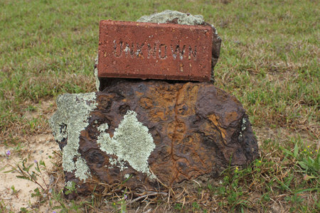 Unknown Grave in Historic Cemetery Marked With Large Rockの写真素材