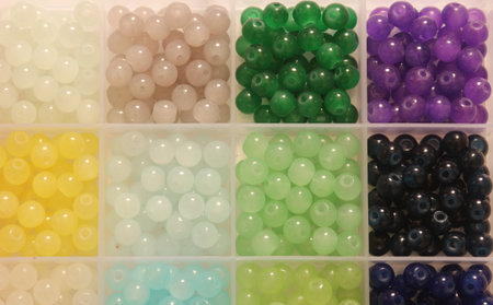 Box of 6mm Glass Beads Mixed Colors for Jewelryの写真素材