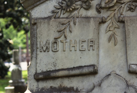Headstone in Historic Cemetery With Word Mother Engravedの写真素材
