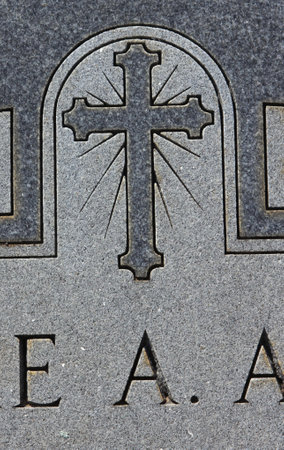 Close up of Historic Headstone With Cross in Rural East Texas Cemeteryの写真素材