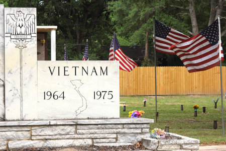 Vietnam War Memorial in Cemetery With American Flag. Memorial Cemetery Tyler TXの写真素材