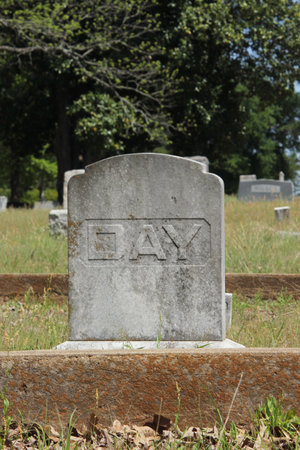 Headstone in Cemetery With Word Dayの写真素材