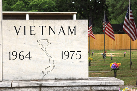 Vietnam War Memorial in Cemetery With American Flag. Memorial Cemetery Tyler TXの写真素材