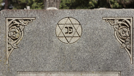 Headstone With Star of David and Hebrew Writing For Here Liesの写真素材