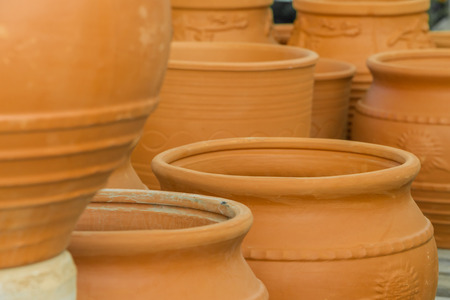 clay flower pots, flower beds, plants for decorationの写真素材