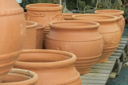 clay flower pots, flower beds, plants for decorationの写真素材