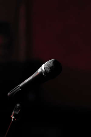 Close-up microphone on a black backgroundの写真素材