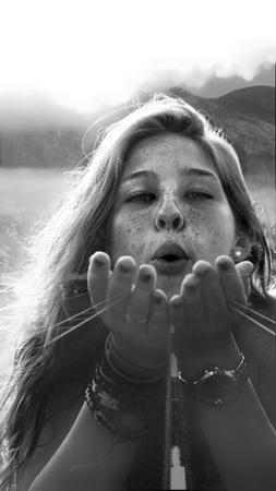 Girl blowing in sleepの写真素材