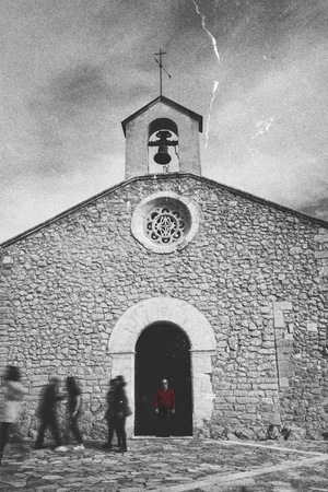 Man leaving vintage buildingの写真素材