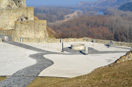 square with well old ruins of former castle near Bratislava cityの写真素材