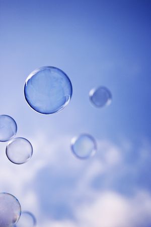 Flying soap bubbles in the airの写真素材