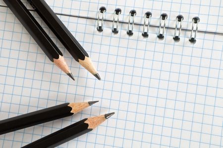 Pencils on a empty white square block.の写真素材