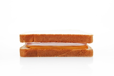 Ham and cheese sandwich isolated on white background, side view.の写真素材