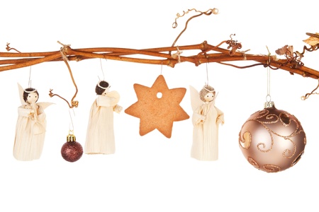 Traditional natural christmas still life. Bethlehem, the birth of Jesus and the three king with star shaped gingerbread cookie hanging from vineyard branch.のeditorial素材