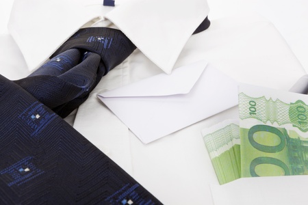 Dress shirt with blue neck tie hundred eur banknotes with envelope and pen in pocket  Traditional business still life の写真素材