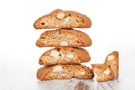 Delicious cantuccini cookie stack isolated on white wooden texture  Culinary traditional italian sweet dessert の写真素材