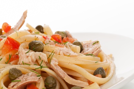 Luxurious colorful pasta detail with capers and tuna  Culinary italian eating の写真素材