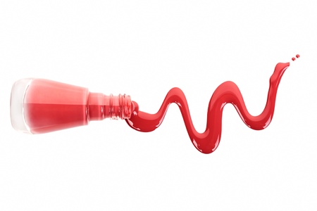 Red nail polish in bottle and spilled isolated on white background, top view  Luxurious glamour cosmetics concept の写真素材