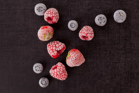 Delicious frozen berry fruits. Strawberries, blueberries and raspberries. Healthy summer fruits, antioxidants.の写真素材