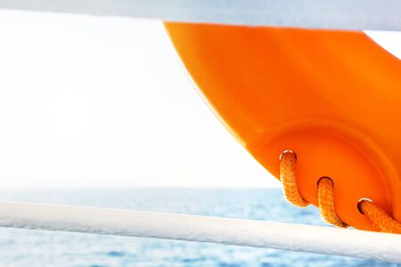 Detail of rescue circle on a boat during a summer sunny day.の写真素材