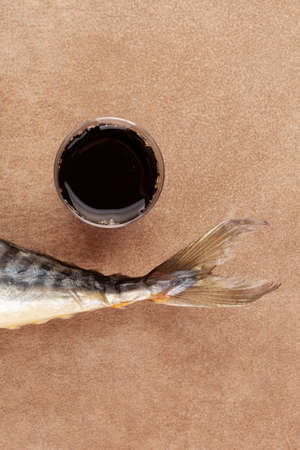 Collagen drink and fresh fish with copy space from above. Natural beauty and health supplement for...
