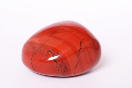 Red jasper stone on white backgroundの写真素材