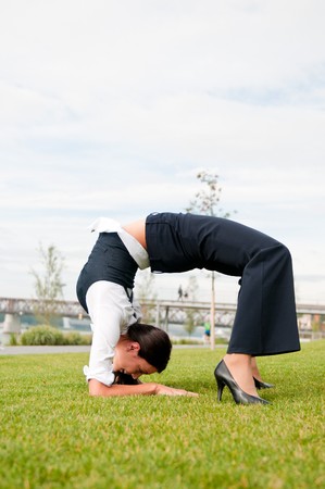 Flexibility - business woman outdoorsの写真素材