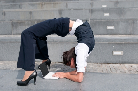 Flexible business - woman with laptobの写真素材