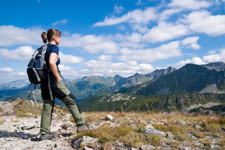 Hiking young person in mountains - relax sceneの写真素材