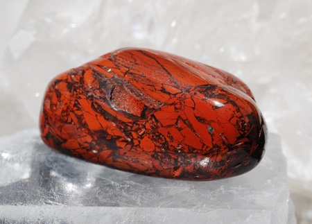 Red jasper gem energized on druze of quartz crystals. This gem is used as a jewel stone and also in...