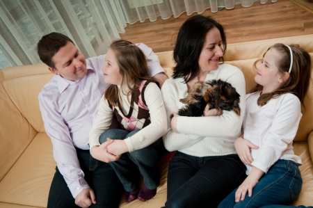 Family together at homeの写真素材