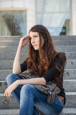 Depression  - young woman outdoor portraitの写真素材