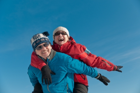 Winter fun - happy senior coupleの写真素材