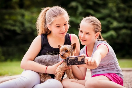 Children and dogの写真素材