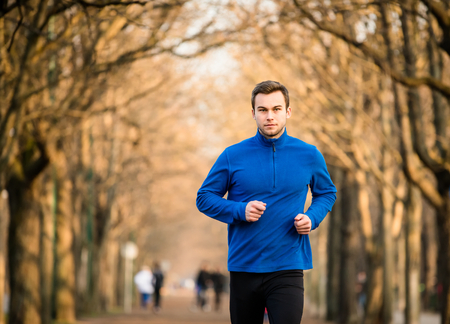 Man jogging in early spring nature