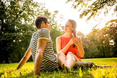 Young couple dating in natureの写真素材