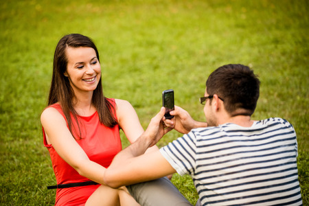 Couple on date - taking photo