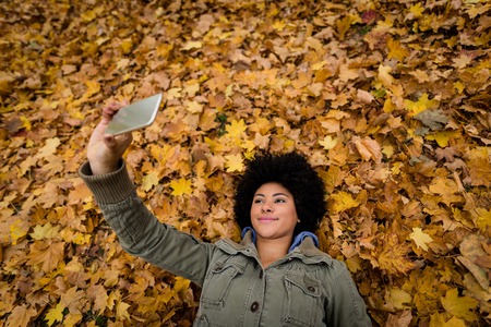 Overhead shot of a woman clicking selfieの写真素材