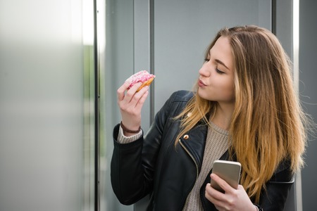 Feeling sweet - woman with donut