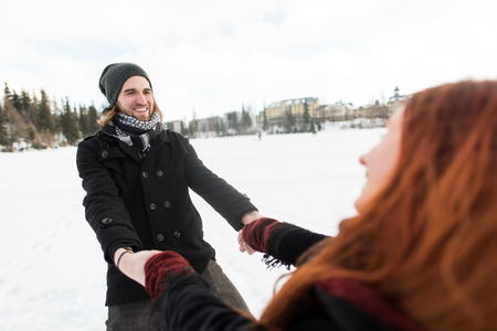 Joyful young couple having fun in Tatra mountainsの写真素材